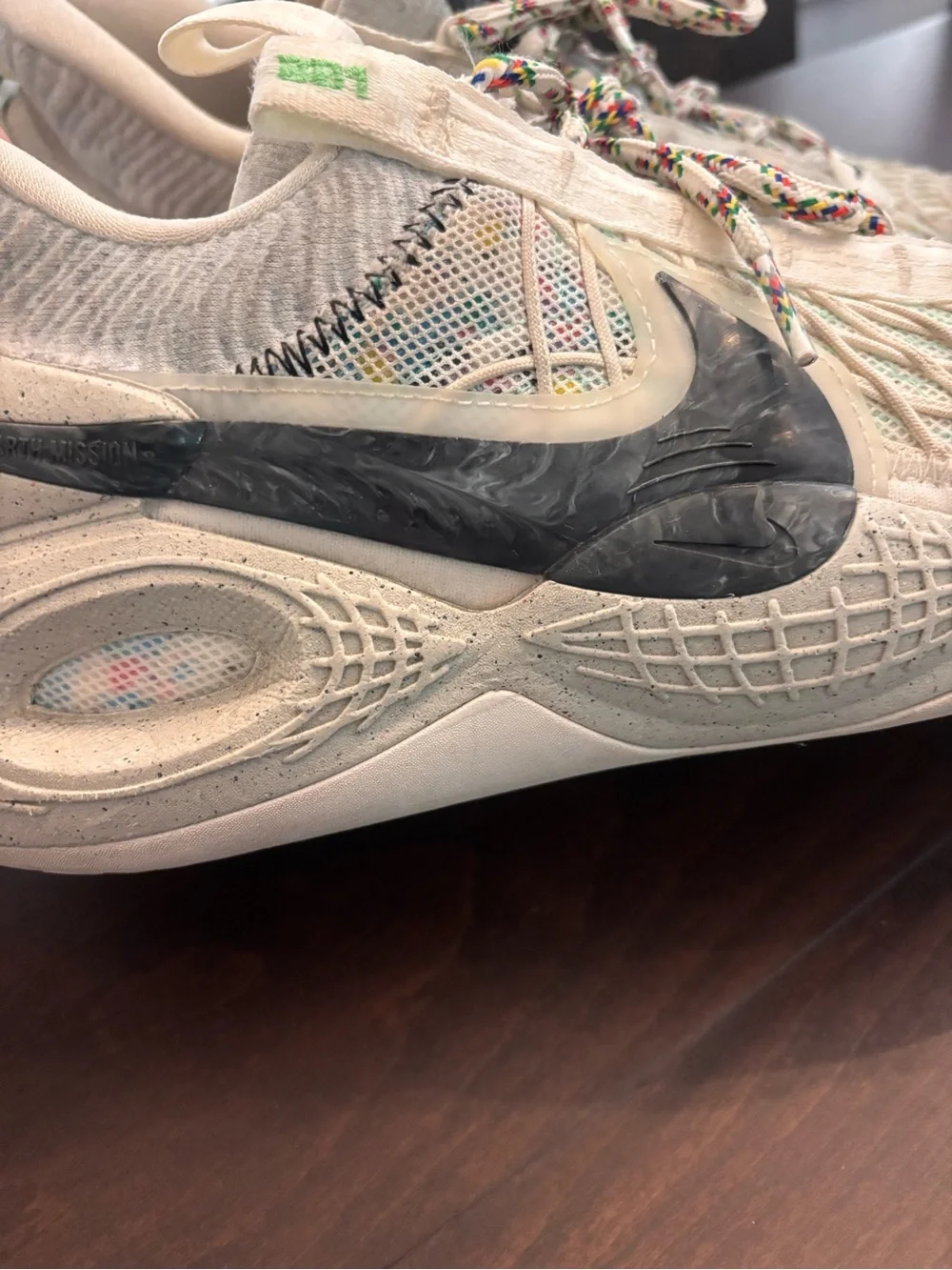 Nike Cosmic Unity Cream and Black Running Shoes